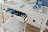 Close-up of antique white finish and dark bronze knobs on Robbinsdale vanity
