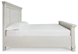 Side profile of Robbinsdale Antique White King Panel Bed