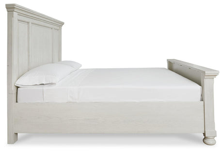 Side profile of Robbinsdale Antique White King Panel Bed