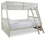 Robbinsdale Antique White Twin Over Full Bunk Bed - angled side view