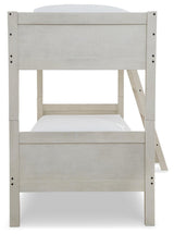 Close-up of ladder and side rails on Robbinsdale Antique White Twin-Over-Twin Bunk Bed