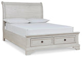 Robbinsdale Antique White Full Sleigh Storage Bed side view