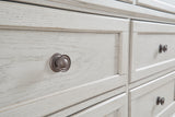 Dark bronze-tone knobs detail on Robbinsdale dresser