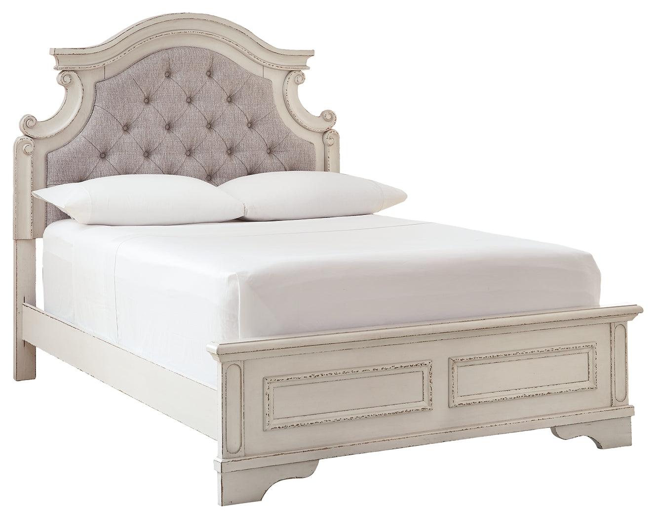 Realyn Full Panel Bed angled view showing upholstered headboard