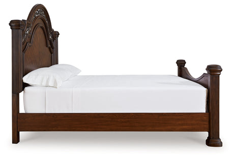 Side view showing sturdy hardwood posts of Lavinton King Poster Bed