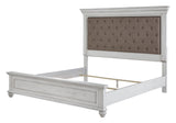Kanwyn Whitewash King Upholstered Panel Bed Angled View