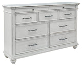 Angled view of Kanwyn Whitewash Dresser showing drawer detail