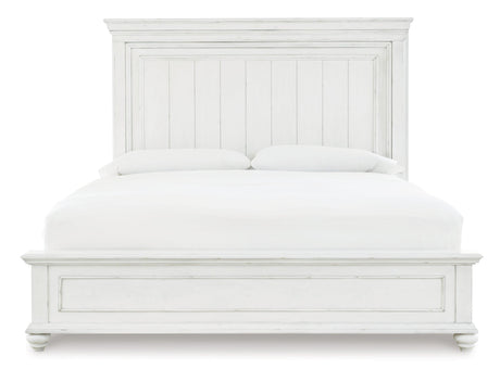 Full view of Kanwyn Whitewash King Panel Bed in bedroom setting