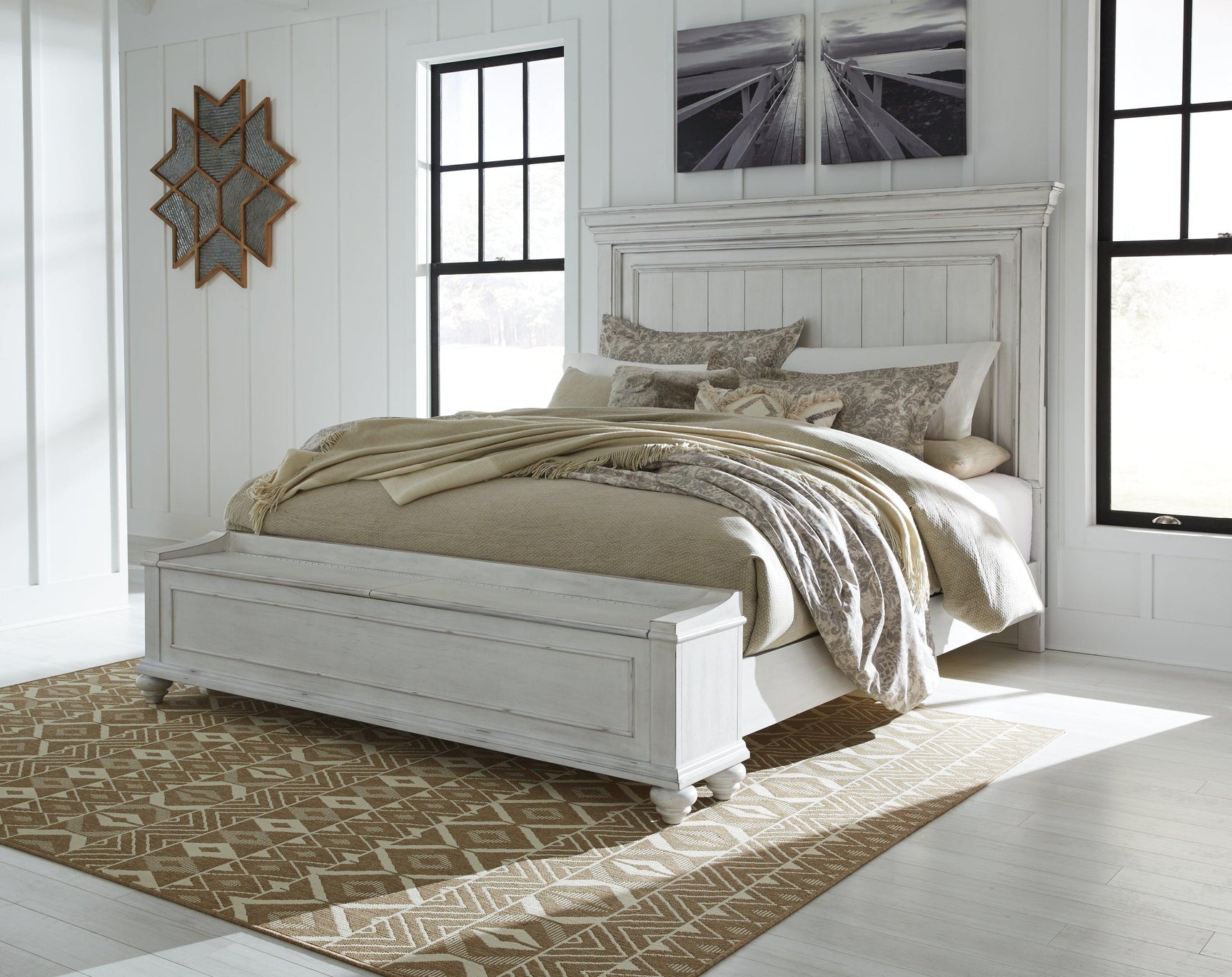 Kanwyn king panel bed full set in bedroom setting