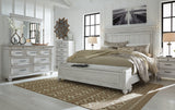 Kanwyn King Panel Bed with storage bench mood lighting A