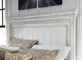 Distressed whitewash panel bed footboard storage bench detail