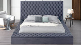 Close-up of Catalina Gray tufted headboard with storage panels