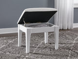 Open seat revealing hidden storage from top angle