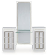 LED-lit mirror with rhinestone frame attached to white vanity