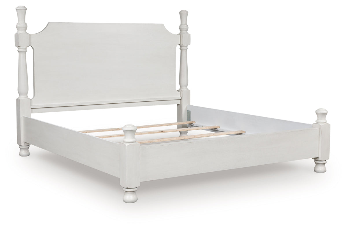 Rowlenstown antique white queen poster bed angled side view