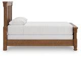 Back view of Rowlenstown Queen Poster Bed revealing solid construction
