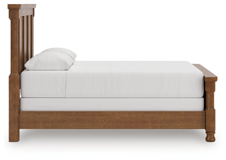 Back view of Rowlenstown Queen Poster Bed revealing solid construction