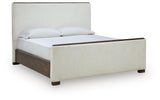 Radkin Burnished Brown Queen Upholstered Panel Bed angled view