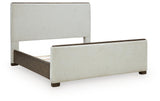Radkin Burnished Brown Queen Upholstered Panel Bed angled view