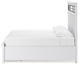 Ashbryn King Storage Bed, side view with drawer detail