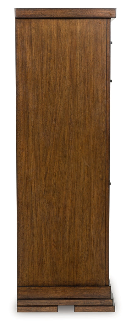 Side view of Taffenbrook medium brown chest of drawers