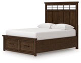 Bed setup in bedroom with medium brown finish