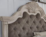 Close-up of sculptural details on headboard