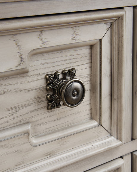 Antiqued bronze-tone drawer knob detail