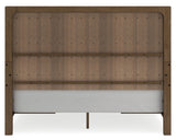 Storage drawers open showing interior space in Cabalynn King Bed