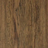 Close-up of light brown glazed finish on Cabalynn Nightstand