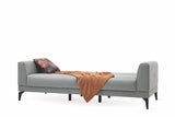Cordell Light Gray 3-Seater Sofa Bed styled in room setting