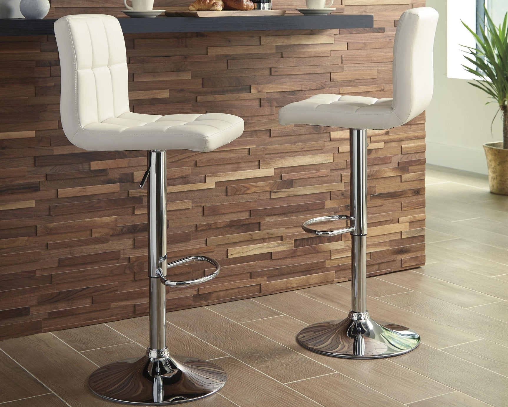 Close-up of bone-colored faux leather upholstery on Bellatier Bar Stool
