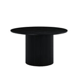 Detail close-up of Elan Black round dining table finish
