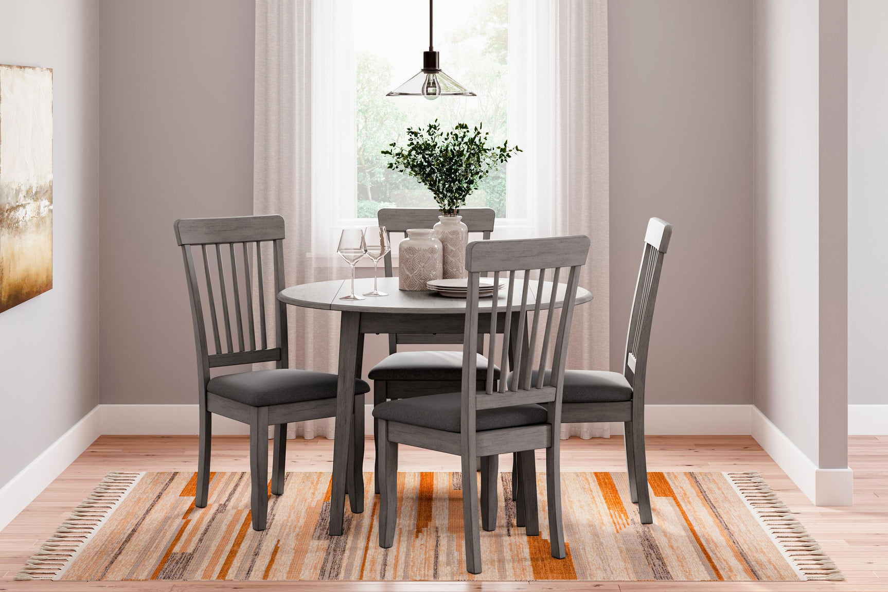Shullden Gray Drop Leaf Dining Table by Ashley – studio view with medium gray finish