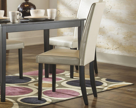 Kimonte Ivory Dining Chair front angle with black wood frame and ivory upholstery