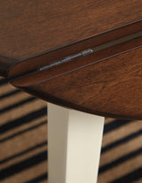 Close-up of table edge showing two-tone finish