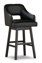 Close-up of Tallenger stool cushioned seat in black faux leather
