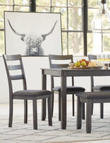 Side angle of Bridson dining bench and chairs