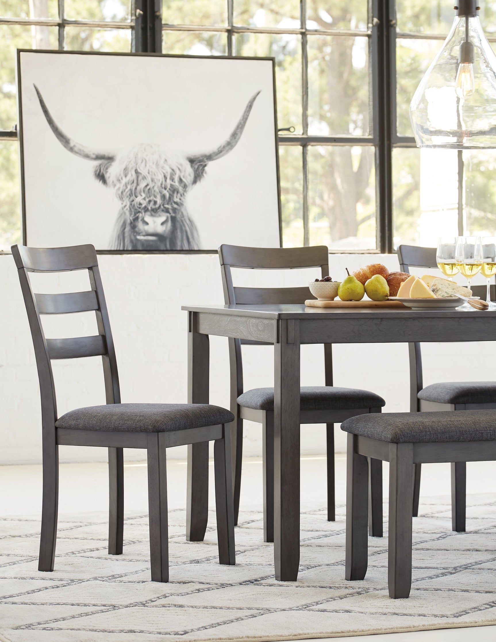 Side angle of Bridson dining bench and chairs