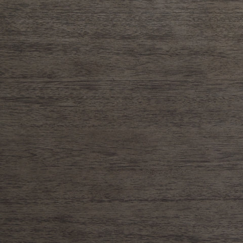 Close-up of antique gray wash texture on Caitbrook furniture