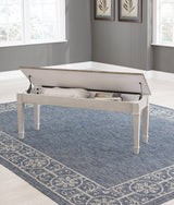 Skempton storage bench angled with storage open