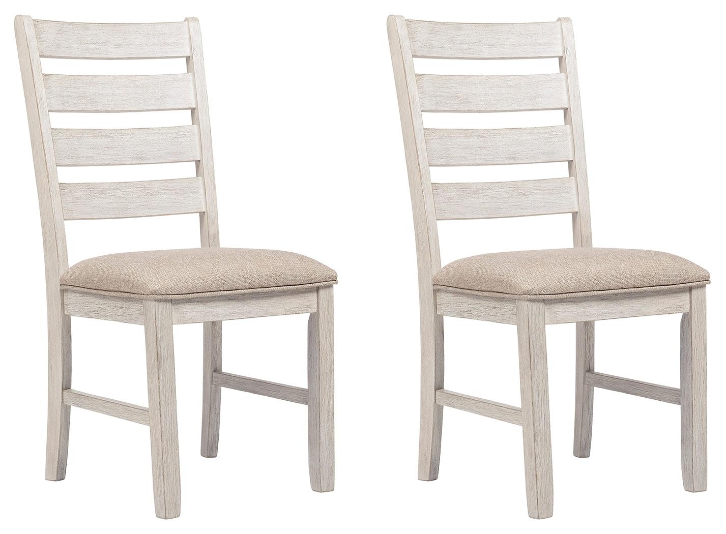 Skempton dining chair showing cushioned seat and ladderback