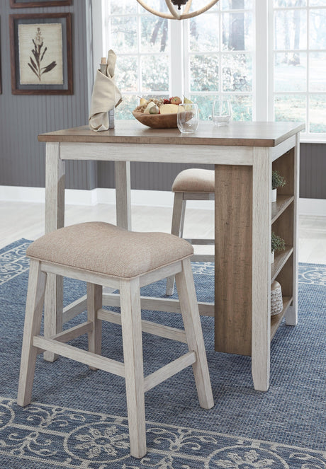 Detail of distressed grayish white finish on table base and light brown table top