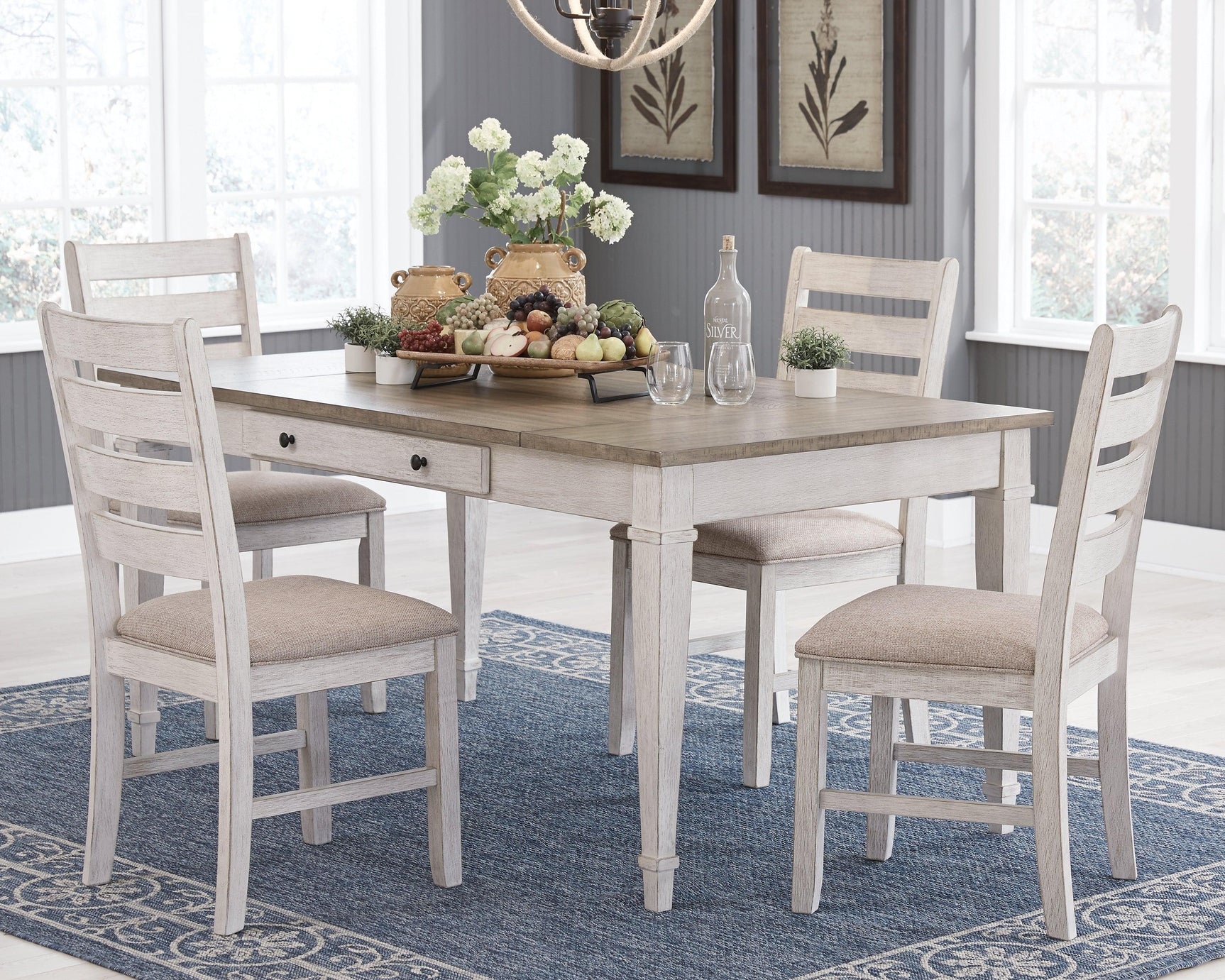 Side angle of Skempton dining table showing two-tone finish