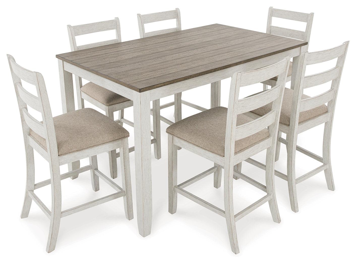 Counter height bar stool with ladderback design and cushioned seat, side angle