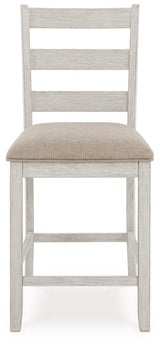 Bar stool front view showing upholstery and overall height