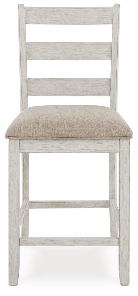 Bar stool front view showing upholstery and overall height