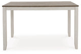 Dining table head-on view highlighting rectangular shape and finish