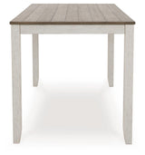 Side view of dining table showing leg base and top thickness