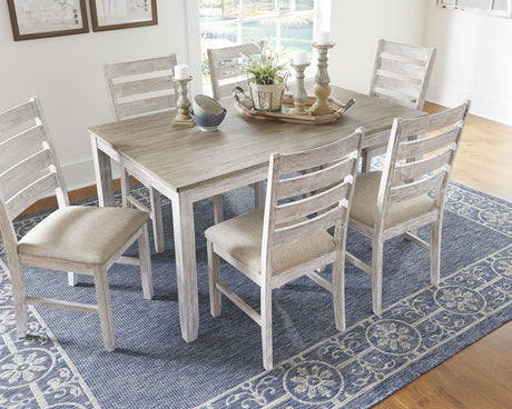 Side angle of Skempton dining set highlighting white upholstered chairs